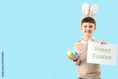 Cute little boy wearing bun...