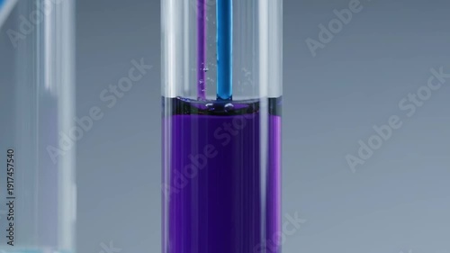 Wallpaper Mural A blue and purple rod is lowered into a test tube with purple liquid, creating bubbles. Scientific experiment. Torontodigital.ca
