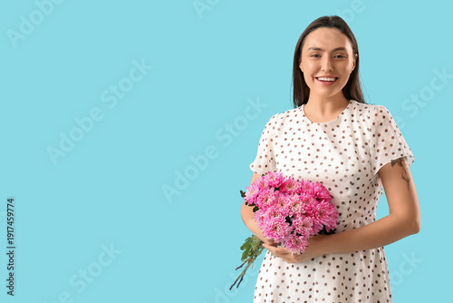 Happy young woman with bouq...