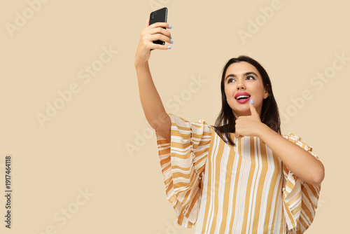 Beautiful happy young woman...