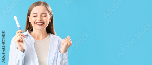 Happy young woman with posi...