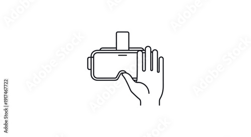 Hand holding virtual reality headset device.
