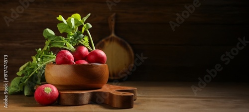 Bowl of fresh radish on wooden background with space for text