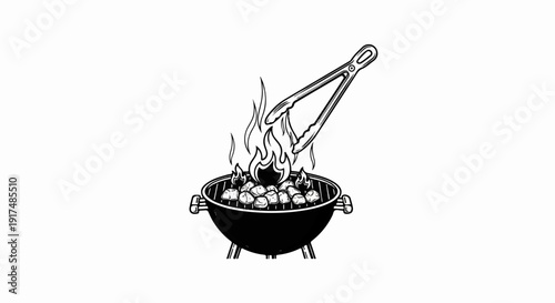 Barbecue grill with food cooking over flames and tongs