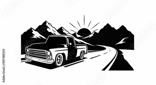 Classic pickup truck drives on winding road toward sunrise over mountains