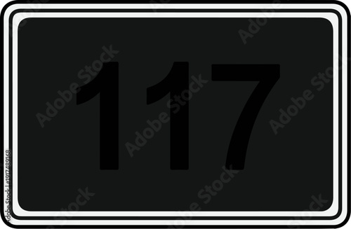 Black rectangular sign with rounded corners displaying the number 117 in white