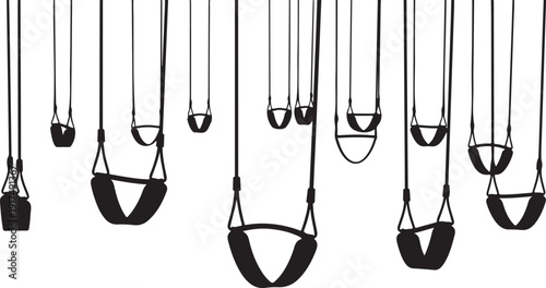Black baby swing hanging from the ceiling in rows