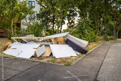 Bulk garbage day concept, miscellaneous rubbish items put on a street for council bulk waste collection, bulky waste and waste management