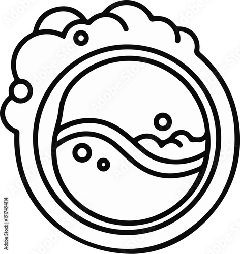 Bubbles rising from water waves inside a washing machine drum