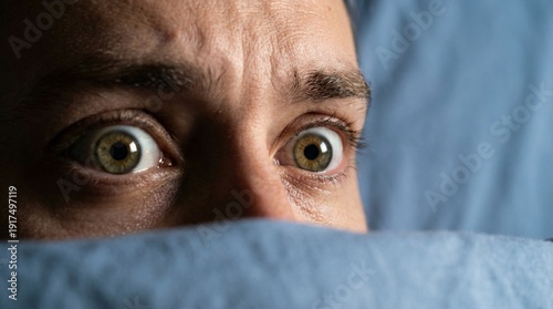 Wallpaper Mural Scared man peeking from blanket on April Fools’ Day Torontodigital.ca