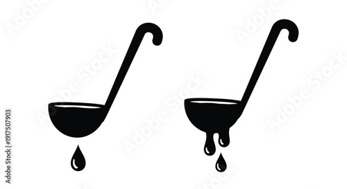Two black ladles with dripping liquid a striking silhouette