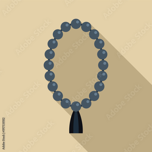 Muslim prayer beads with a long shadow symbolizing faith and devotion