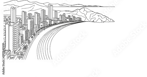 Seaside city with winding road, mountains and ocean horizon