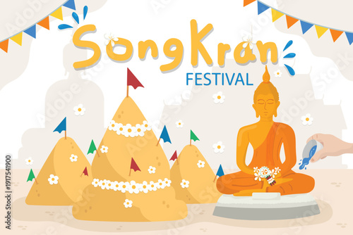 Songkran festival pouring water buddha statues and sand pagoda.