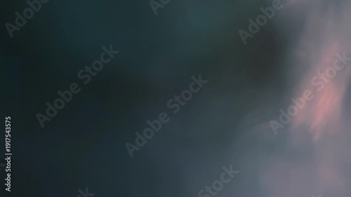 Light leak and bokeh overlay with subtle color shifts and flares. This dynamic visual element is perfect for adding atmosphere and transition effects.