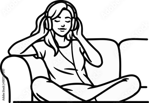 Person wearing headphones on couch, eyes closed, listening to music