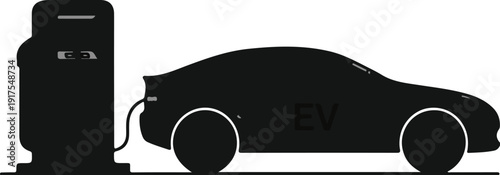 Silhouette of an electric car charging at a station