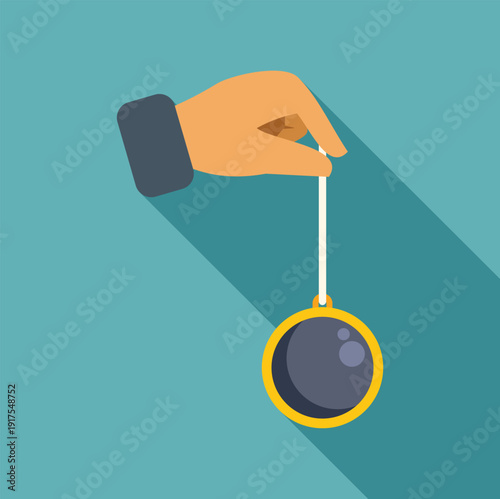Hand holding a dowsing pendulum, symbolizing hypnosis, mysticism, and fortune telling concepts