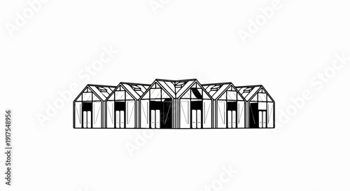 Row of modern greenhouses with transparent roofs and glass doors