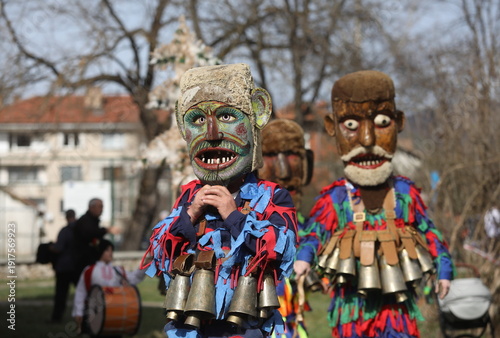 Zemen, Bulgaria - March 15, 2025: Masquerade festival Surva in Zemen, Bulgaria. People with mask called Kukeri dance and perform to scare the evil spirits.