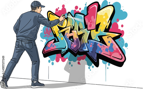 Urban street artist spraying colorful graffiti on a wall