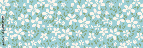 Seamless vector floral pattern with white blossoms and soft green leaves on a light blue background. Fresh, minimal, modern design perfect for textiles, wallpaper, and wrapping