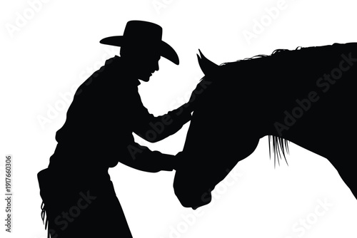 A silhouetted cowboy gently interacts with a horse showing affection