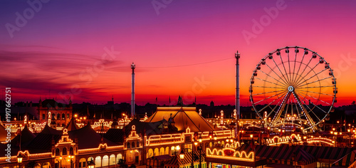 Illuminated Ferris Wheel and traditional casetas at Seville Feri