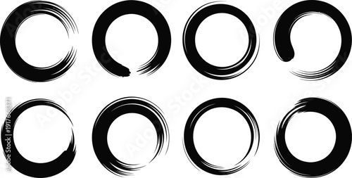 A set of black brush stroke circles on a white background