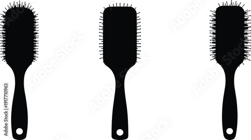 Black silhouette hairbrushes on white background