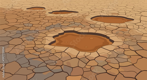 Dry cracked earth with puddles of water