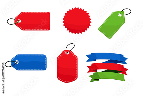 A collection of blank price tags and ribbons in red, blue, and green colors on a black background. The set includes rectangular tags with stitching, a starburst label, and curved ribbons.