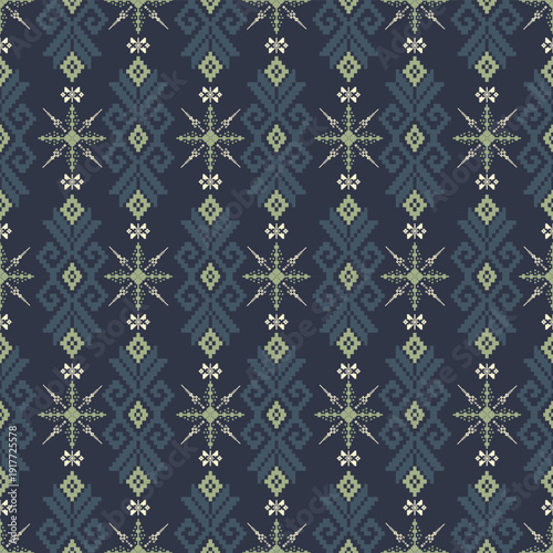 Seamless tribal geometric textile pattern in navy blue and sage green with pixel ethnic motifs, inspired by traditional indigenous weaving.