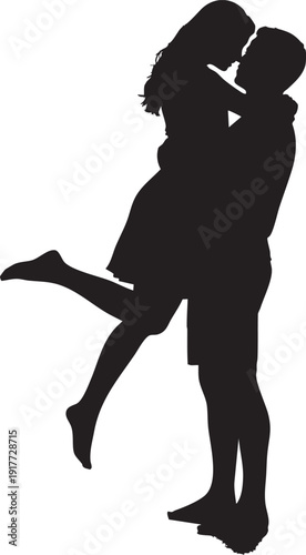 Silhouette of a man holding and kissing a woman romantically outdoors