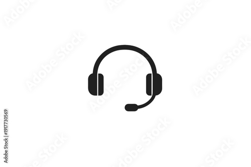 A black silhouette of a communication headset with an integrated microphone is centered on a dark background. This minimalist icon represents customer support, gaming, or call center services.