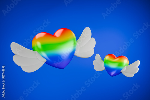 Fotografie Two winged rainbow hearts floating in blue 3d studio space