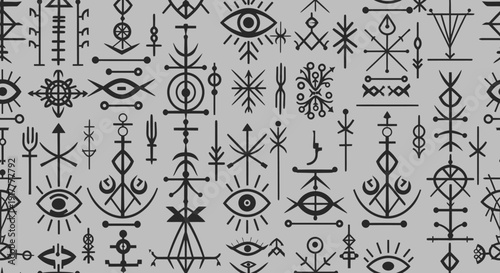 Mysterious ancient symbols and eyes on gray background