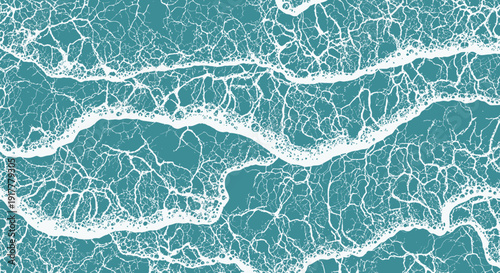 Foamy ocean waves crashing on turquoise water surface