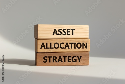 three natural wooden blocks stacked on top of each other saying 'Asset Allocation Strategy'
