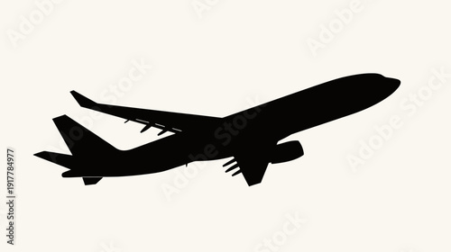 Silhouette of an airplane flying over a light background