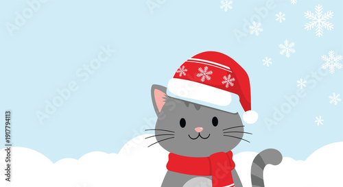 Adorable gray cat wearing a red snowflake hat and a matching scarf standing in a snowy landscape with white clouds and falling snowflakes.