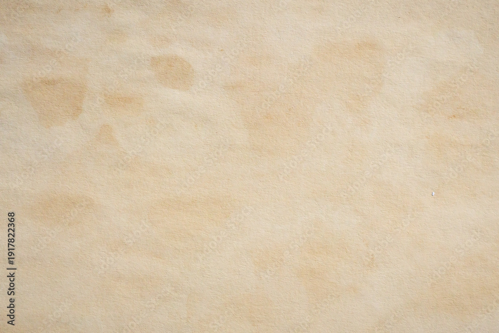 Obraz premium Old vintage paper texture background with aged stains and antique yellowed parchment effect