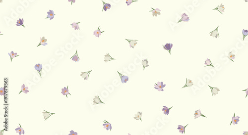 Scattered pattern of small purple and white flowers on a soft cream background creates a delicate floral print for textile design.