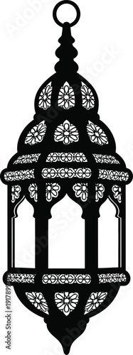 A beautifully designed islamic lantern with intricate patterns and cutouts.