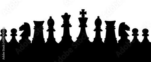 Chess pieces silhouetted against a white background