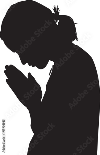 Silhouette of a person in a posture of prayer or contemplation