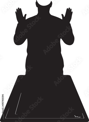 Silhouette of a person in a prayer position atop a pyramid-like structure