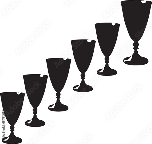Elegant progression of wine glasses arranged in ascending order of height and size.
