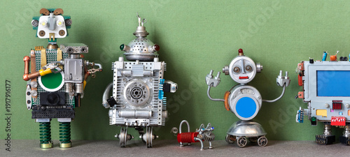Five toy robots and a dog: metal, plastic, with gears, circuit boards, wires and radio components standing in row. Tech toy concept, future technology poster, gadget banner