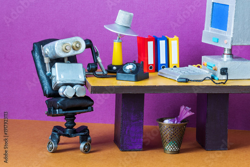 Busy silver robot manager listening on vintage rotary phone, modern computer and folders on desk. Executive concept, office equipment flyer